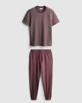 A pair of textured long pyjamas with a shortsleeved top and drawstring bottoms