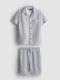 A knitted shirt and shorts co-ord in a stripe pattern