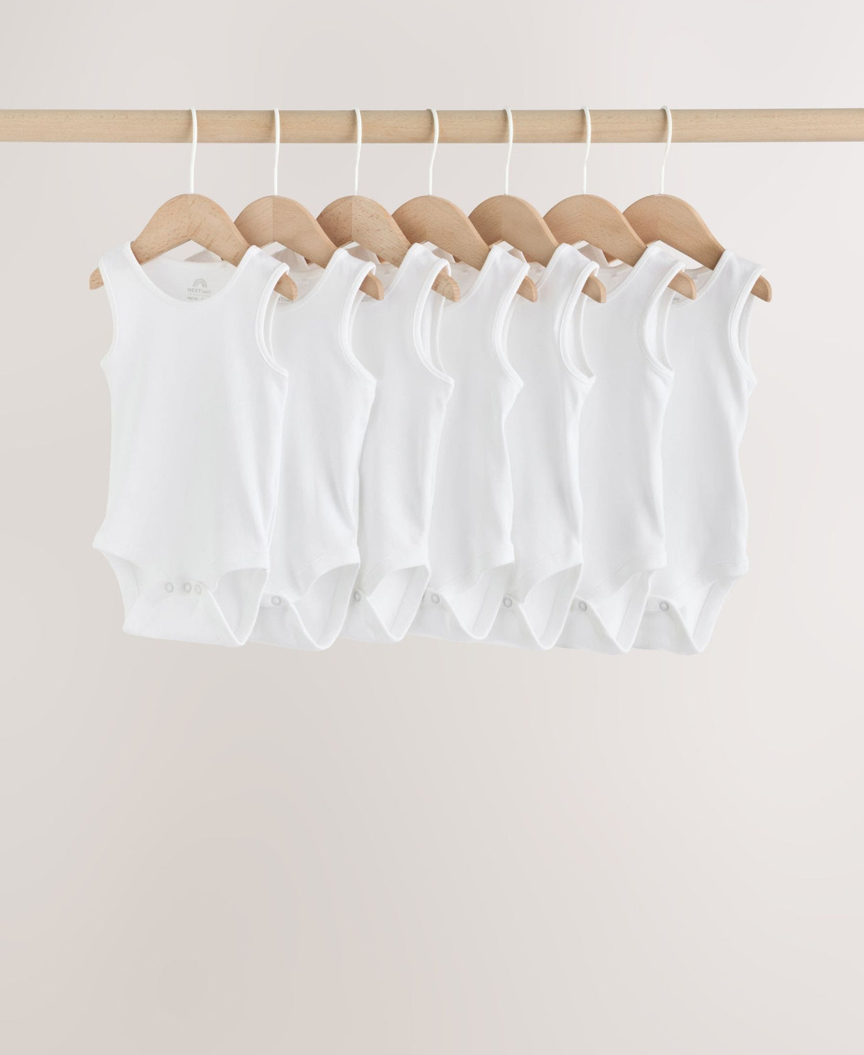 White 7 Pack Baby Vest Bodysuits