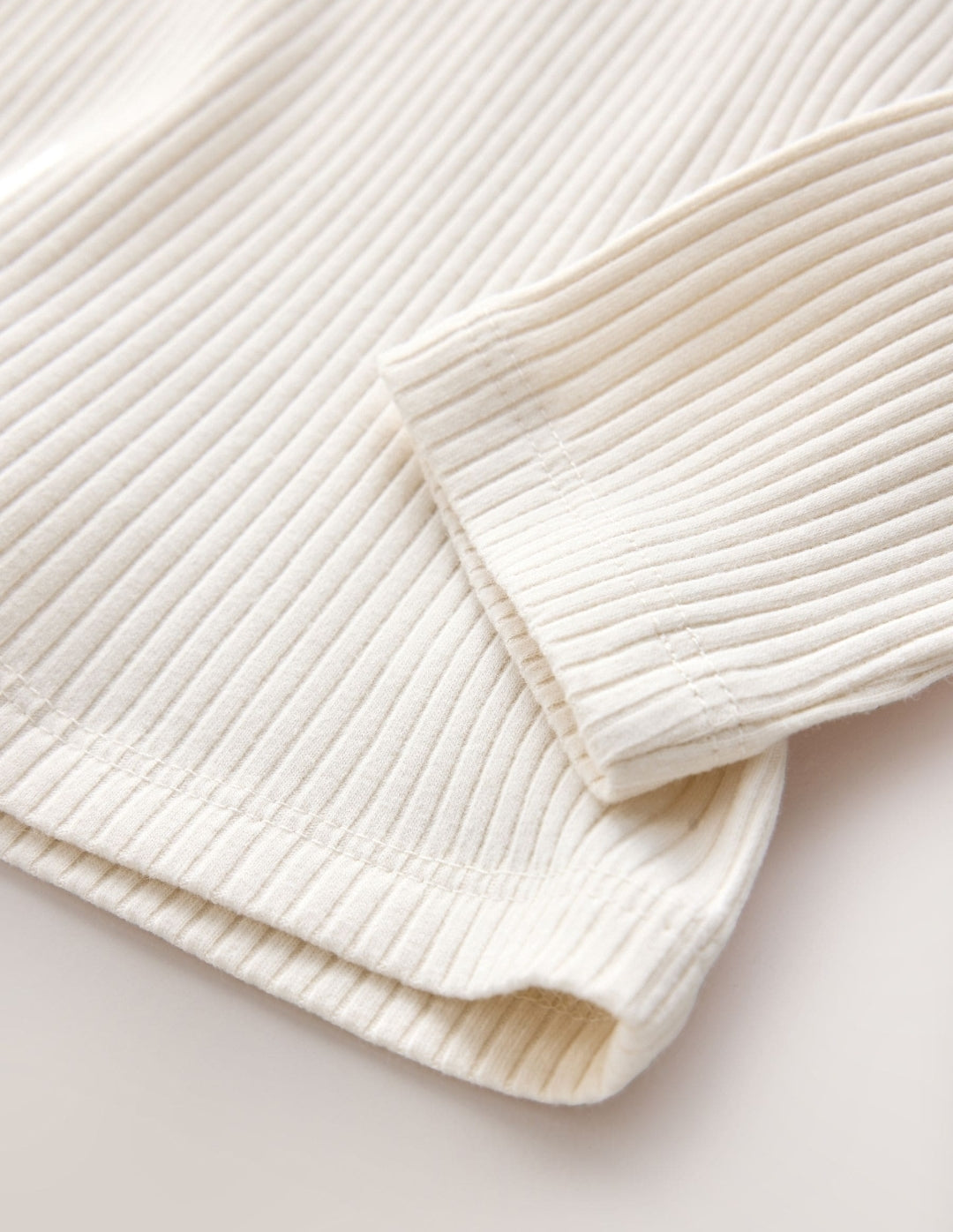 Cream Long Sleeve Roll Neck Rib Top