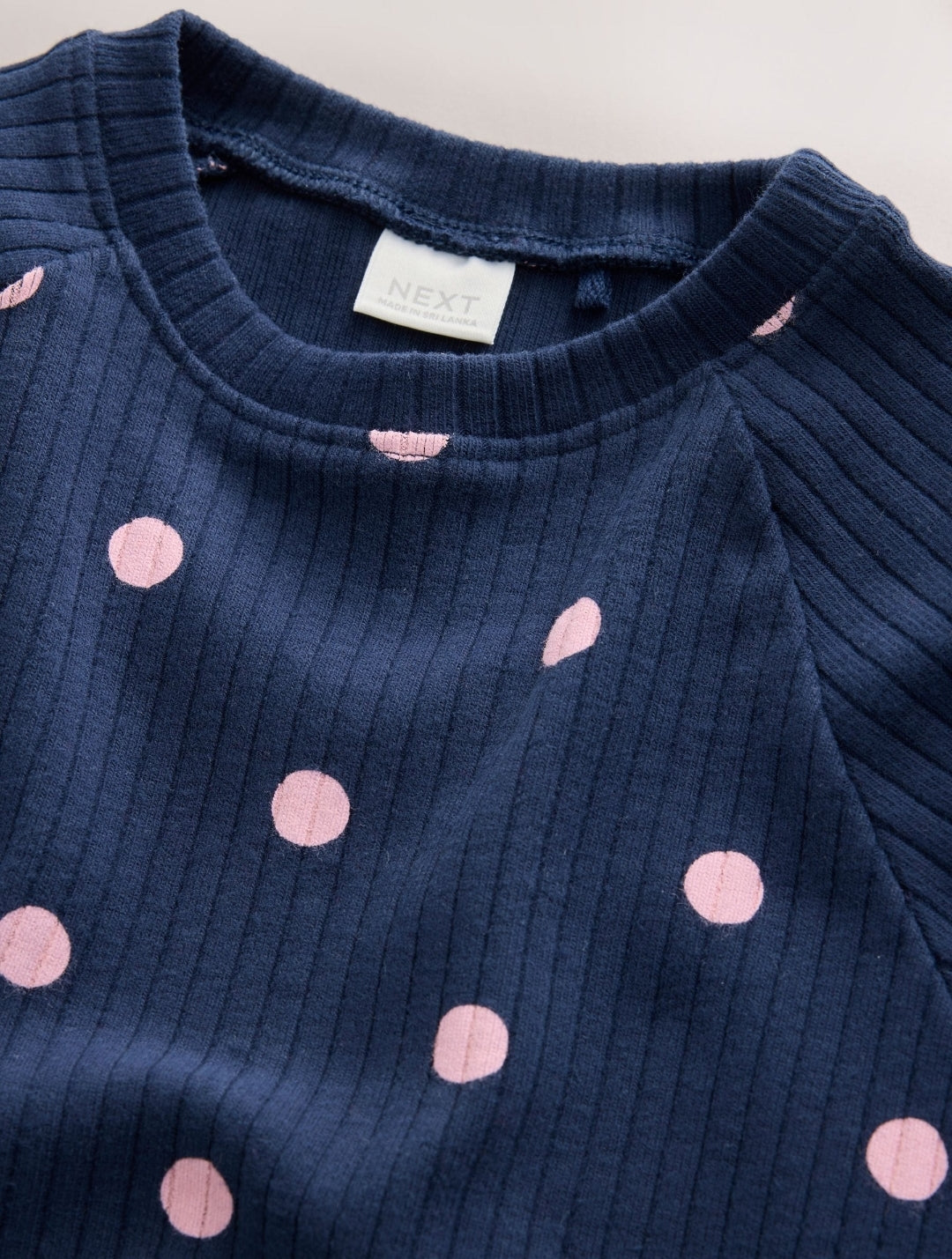 Navy Spot Long Sleeve Ribbed Raglan
Top