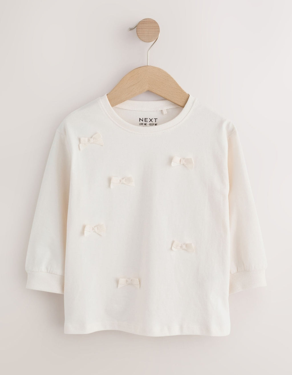 Ecru Bow Applique Long Sleeve Top
