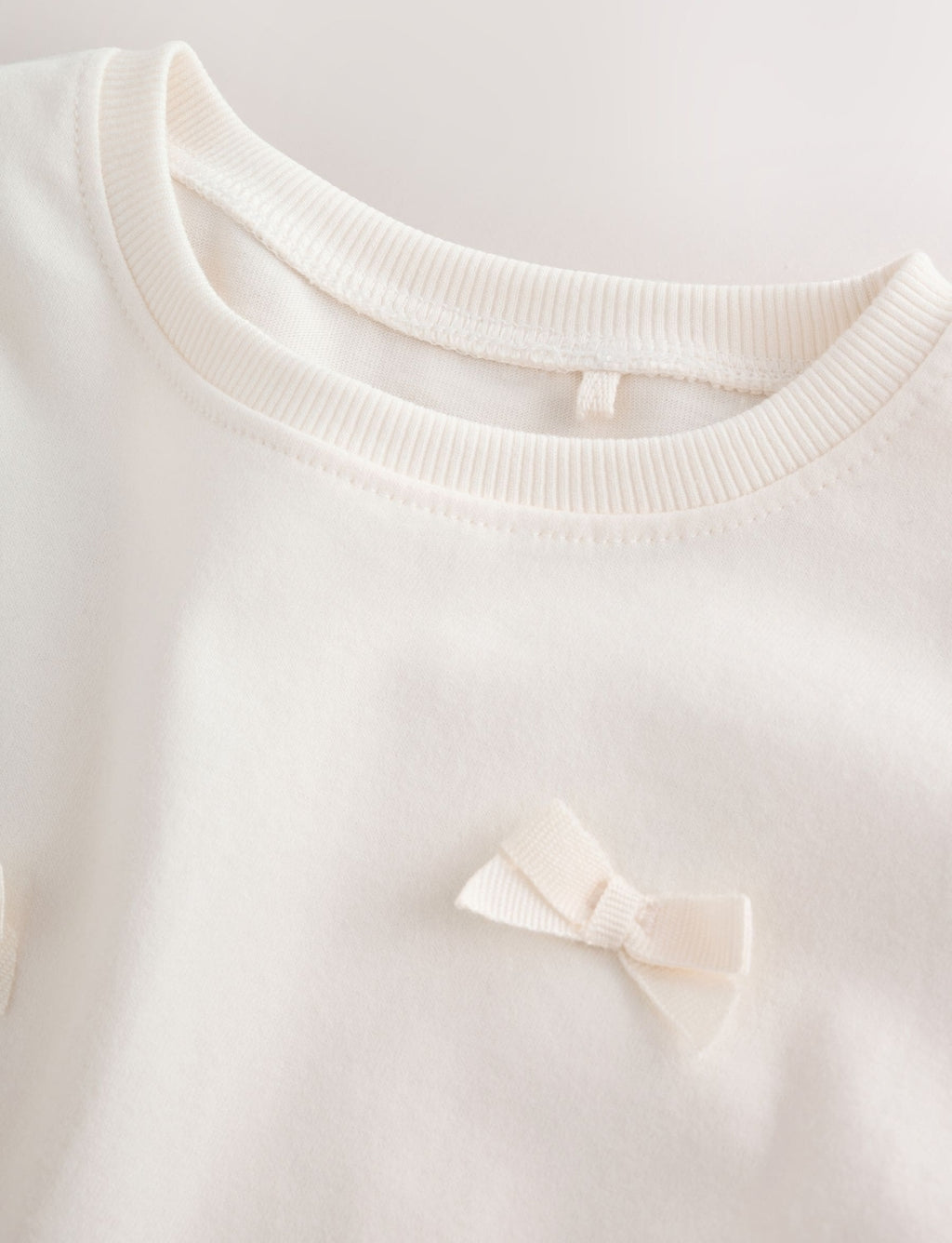Ecru Bow Applique Long Sleeve Top