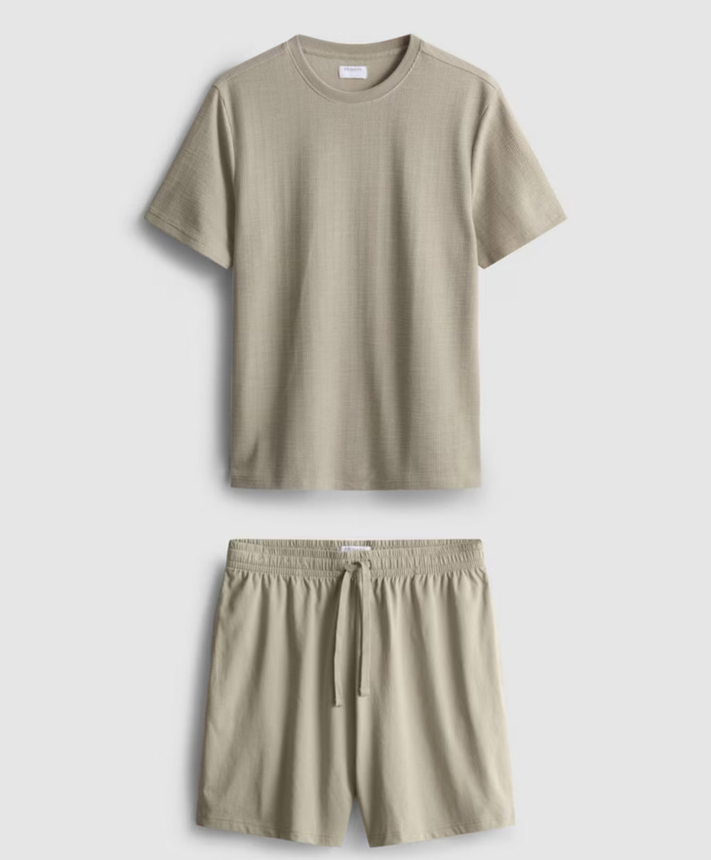 A textured pyjama set with short sleeve tee and drawstring shorts