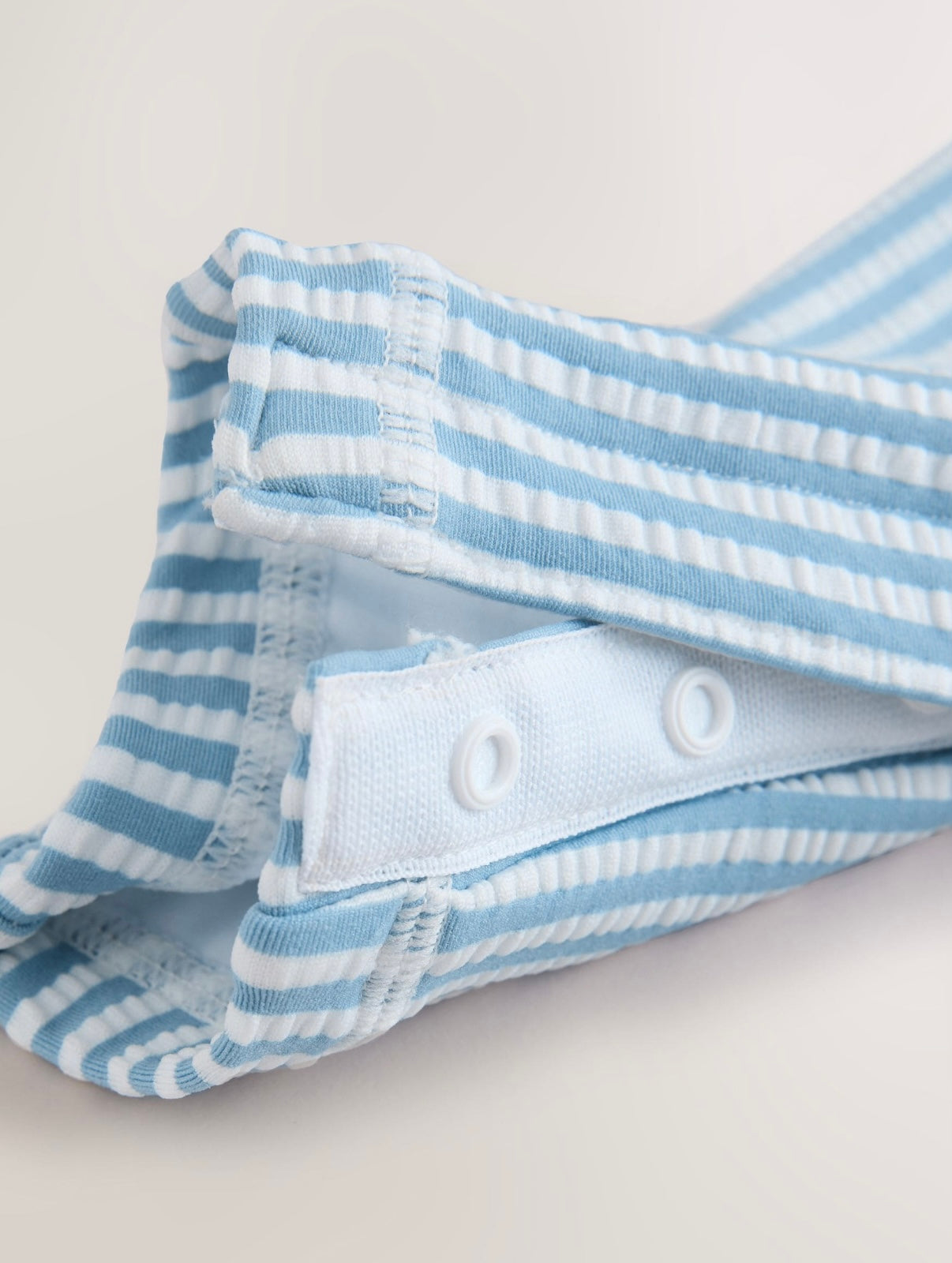 Light Blue Striped Sunsafe Swimsuit and
Hat Set