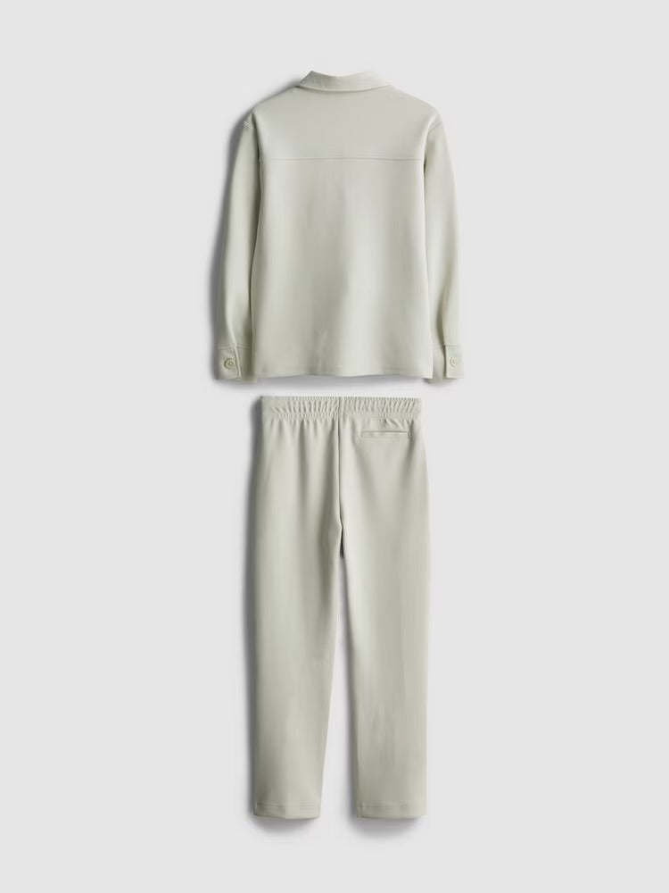 A zip-up jacket and pintuck joggers clothing co-ord