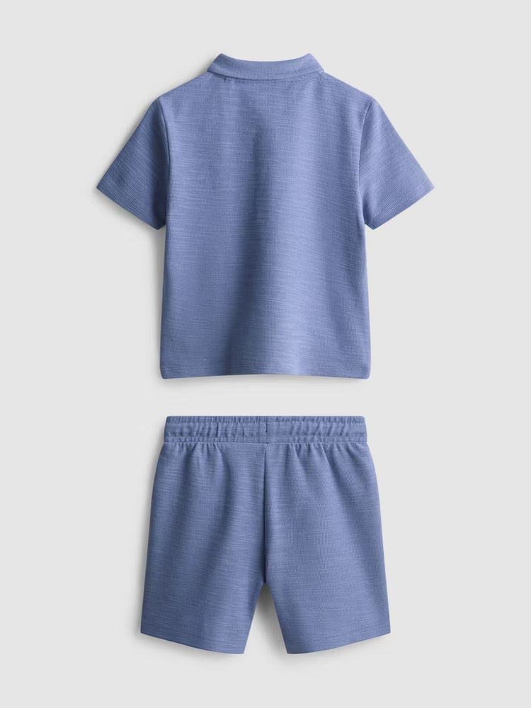 A polo shirt and shorts clothing co-ord