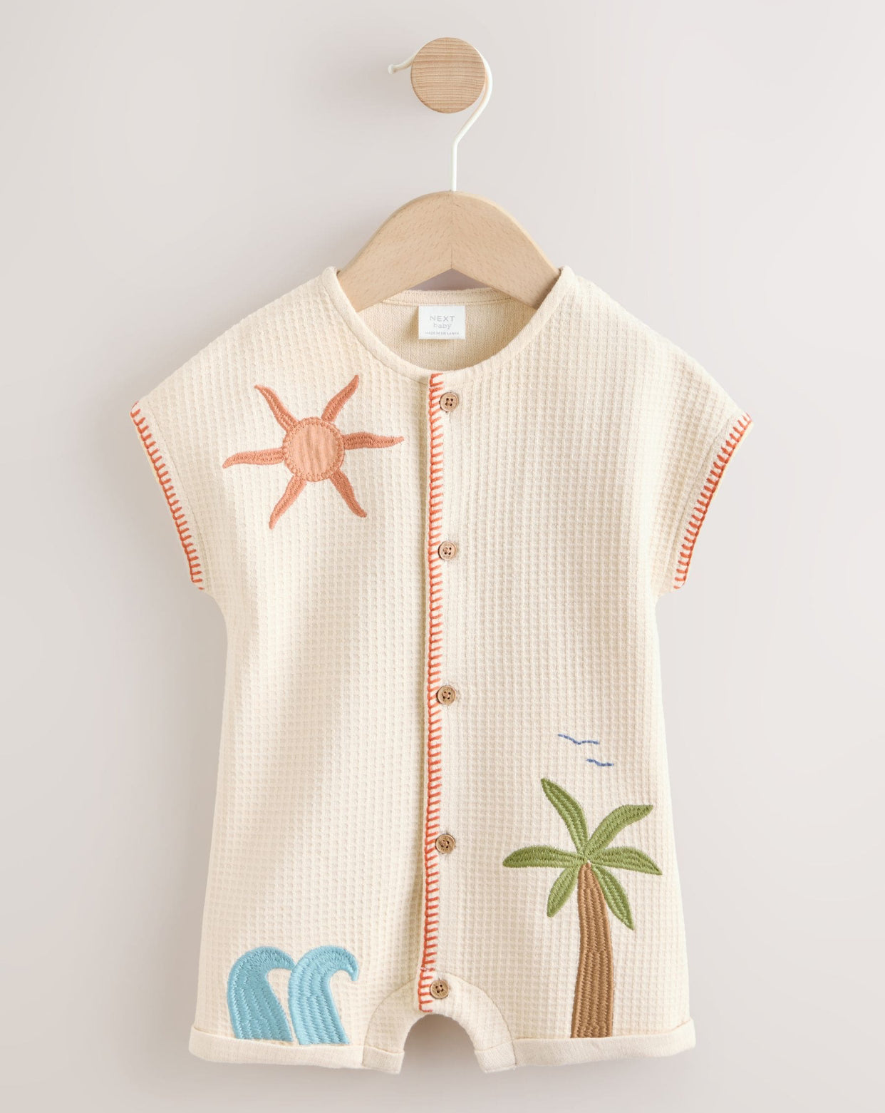 Neutral Palm Print Jersey Waffle Baby
Romper
