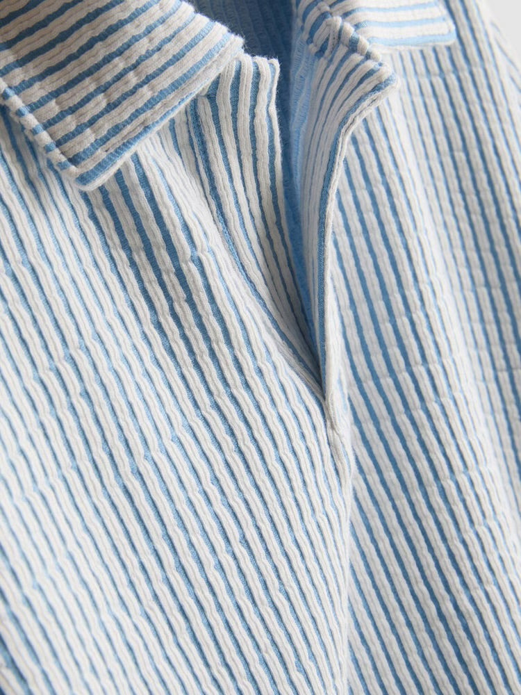 A striped shirt and shorts clothing co-ord