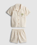 A shirt and shorts co-ord with embroidery detailing