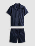 A poplin button-up shirt and drawstring-detail shorts co-ord
