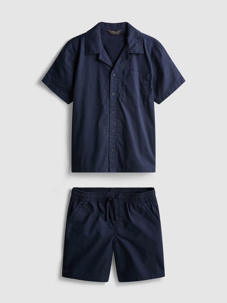 A poplin button-up shirt and drawstring-detail shorts co-ord