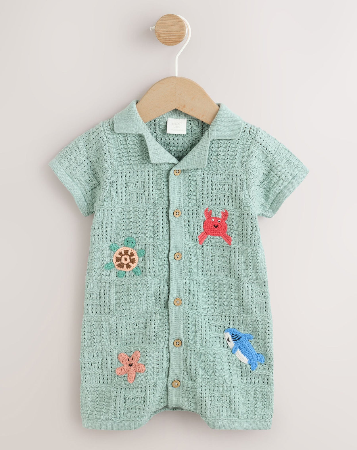 Green Sea Characters Knitted Baby
Romper