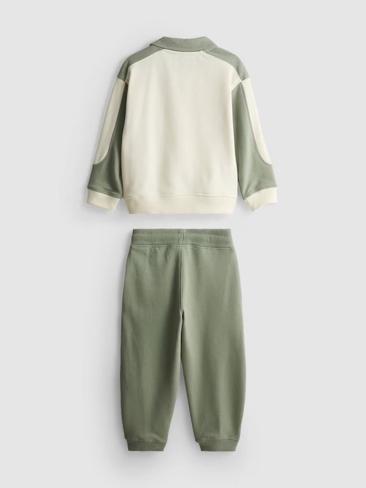 A polo placket sweatshirt and cuffed joggers clothing co-ord