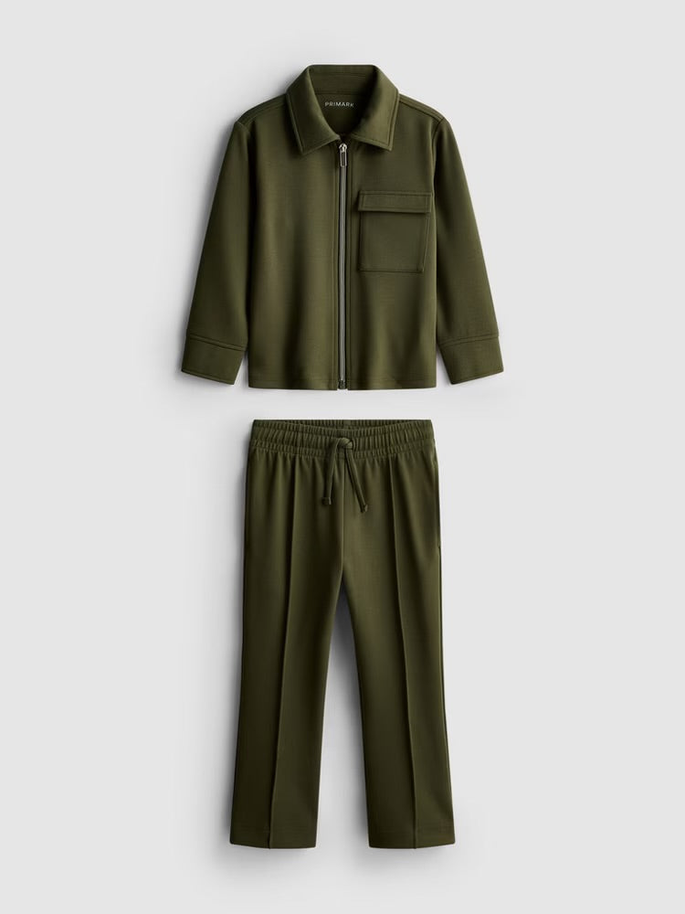 A zip-up jacket and pintuck joggers clothing co-ord