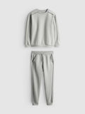 A pullover sweatshirt and cuffed joggers clothing co-ord