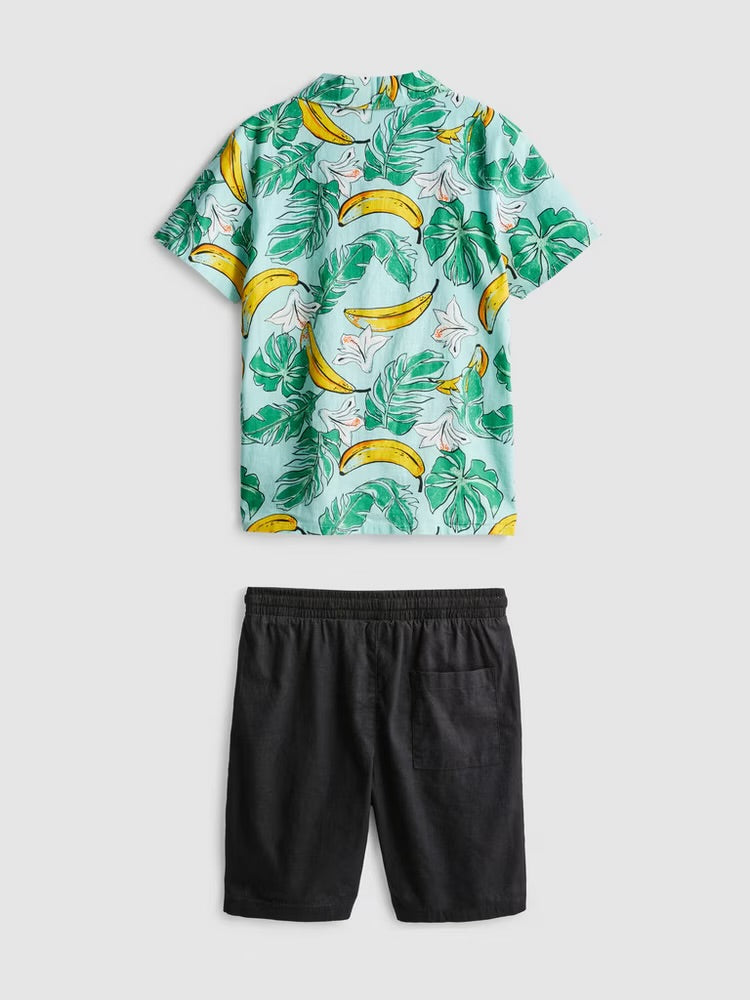 A printed short sleeve shirt and drawstring-detail shorts clothing set
