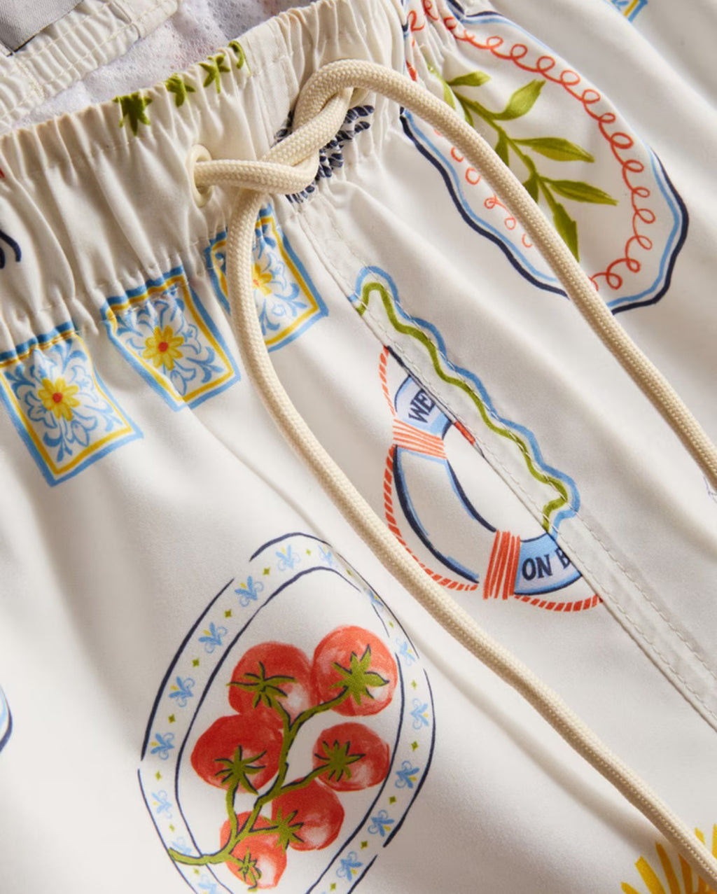 Swim shorts with postcard-inspired design and drawstring waist