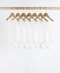 White 7 Pack Baby Strappy Bodysuits