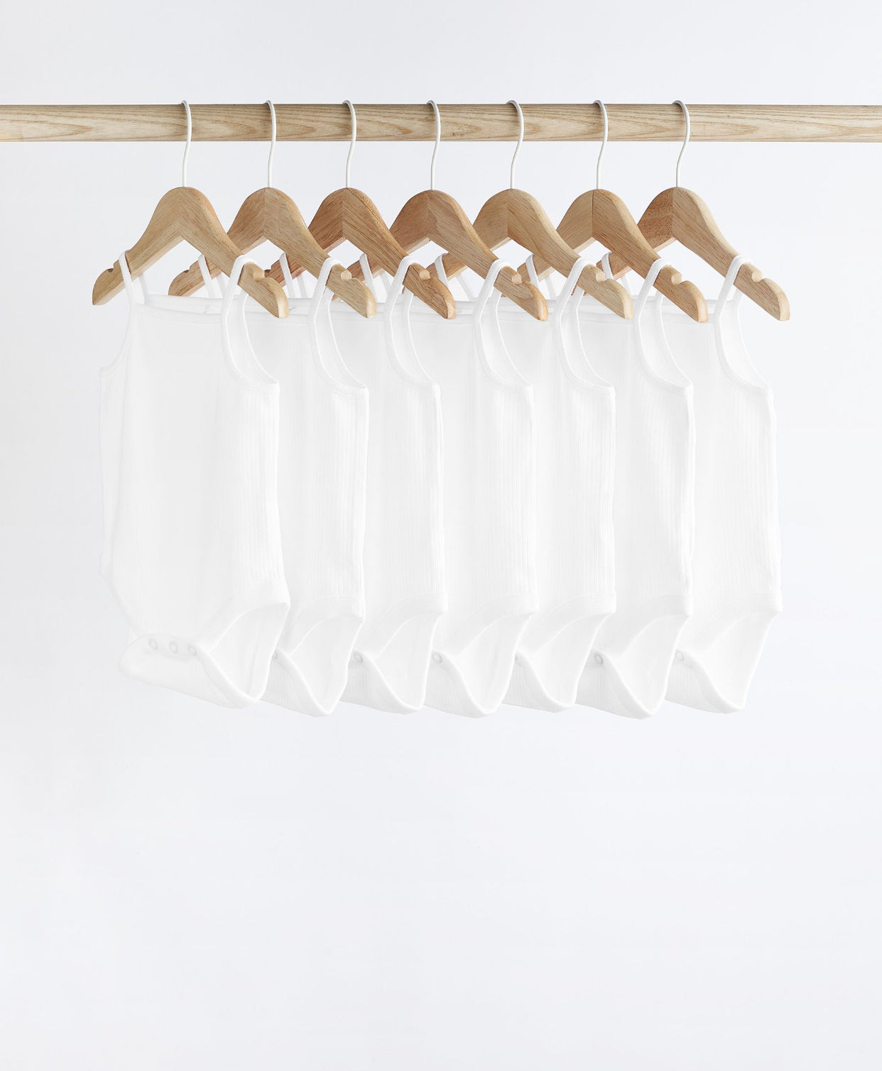 White 7 Pack Baby Strappy Bodysuits
