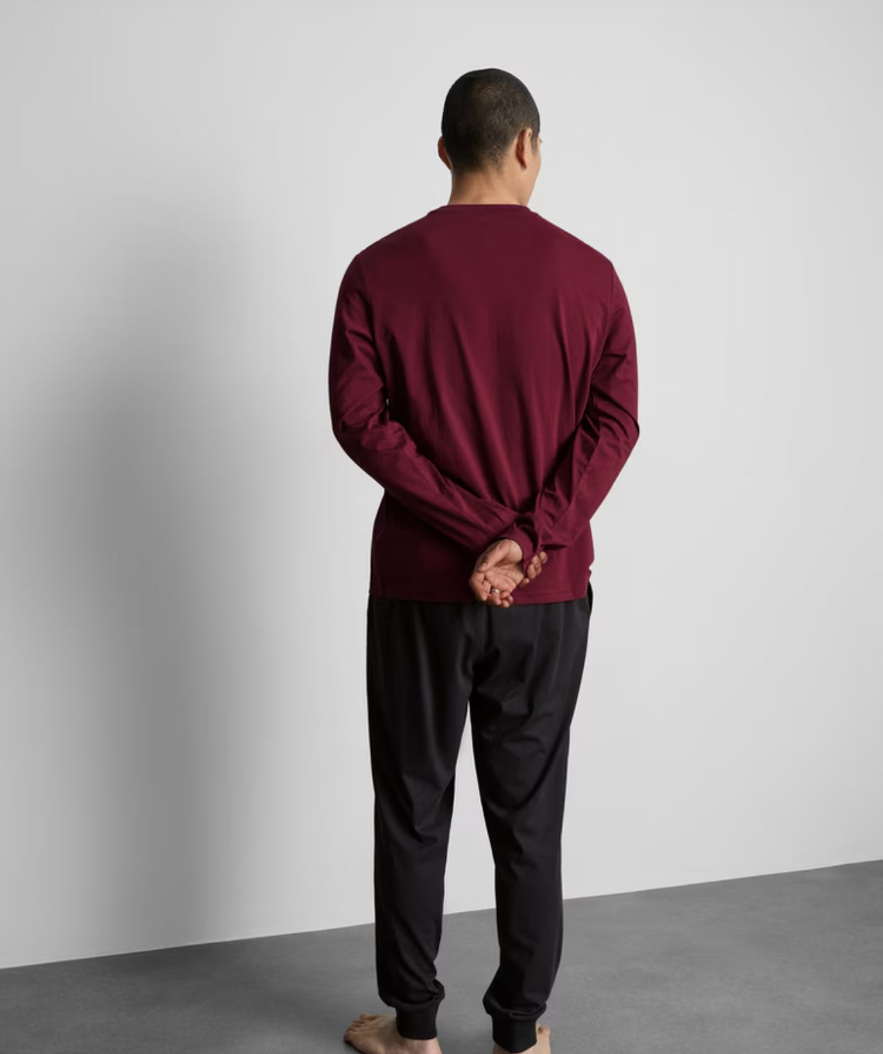 A pair of long pyjamas with top, bottoms and Chicago Bulls logo design