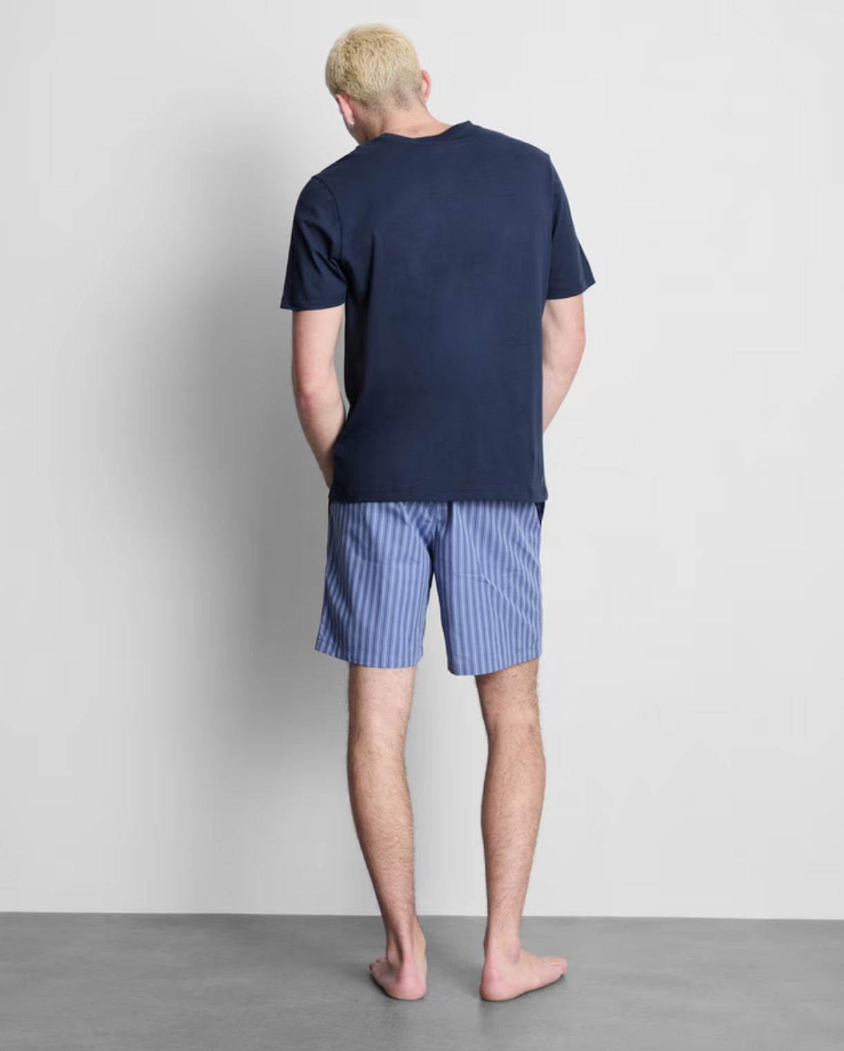 A pair of short pyjamas with short sleeve top and shorts