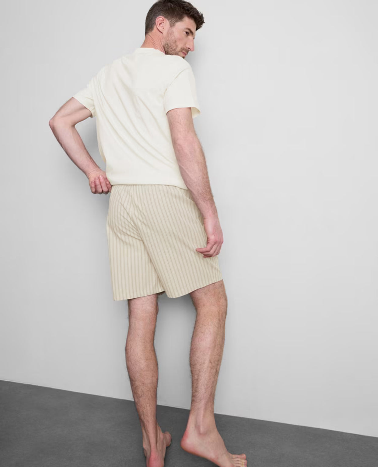 Matching pyjama set with T-shirt and striped drawstring shorts