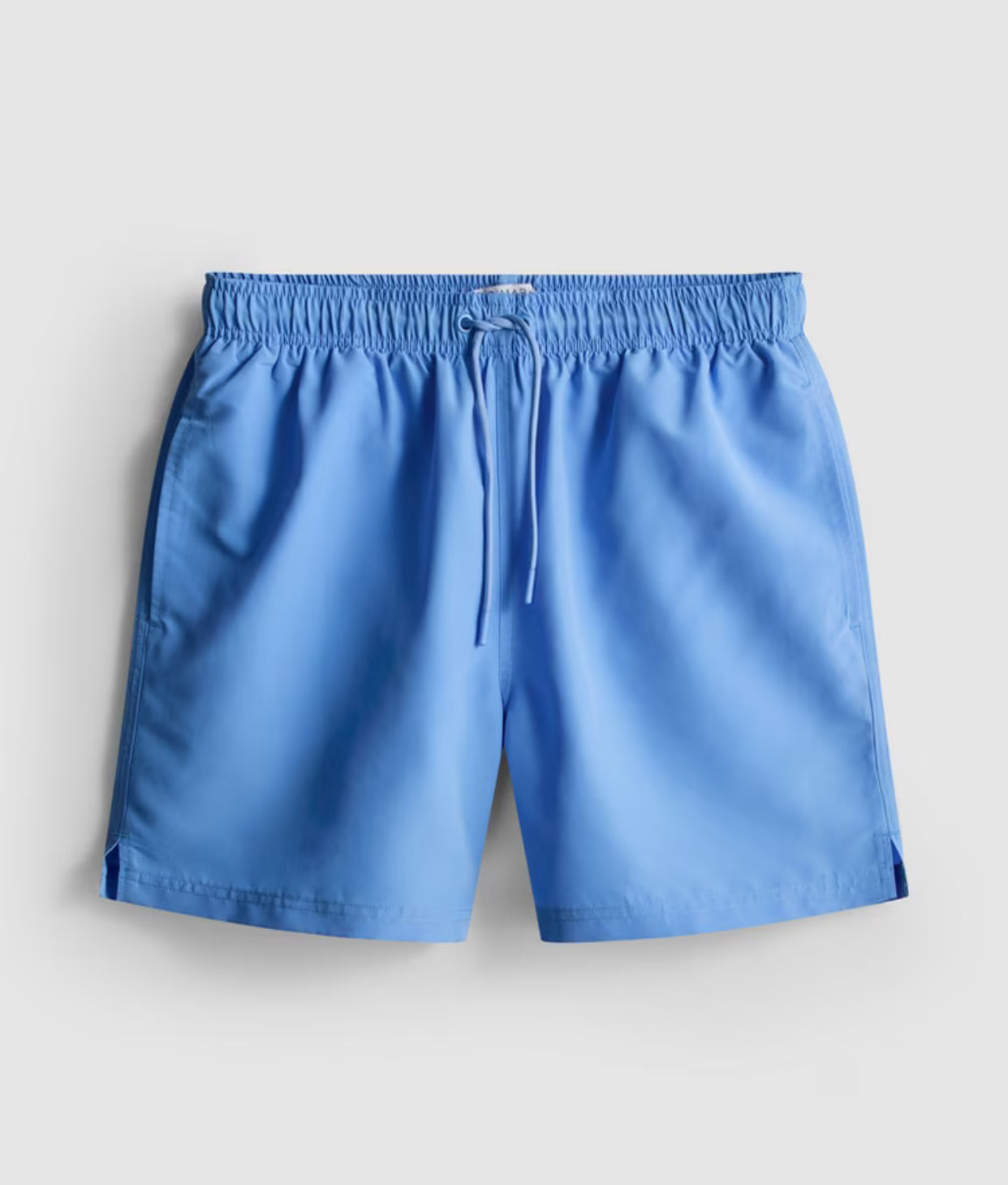 A pair of microfibre swimming shorts with drawstring waistline, and inner mesh