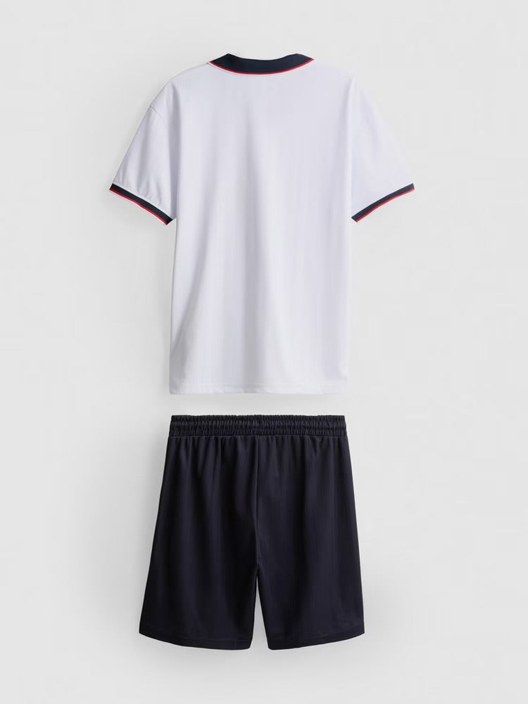 A sporty tee and shorts clothing co-ord with an England football team design