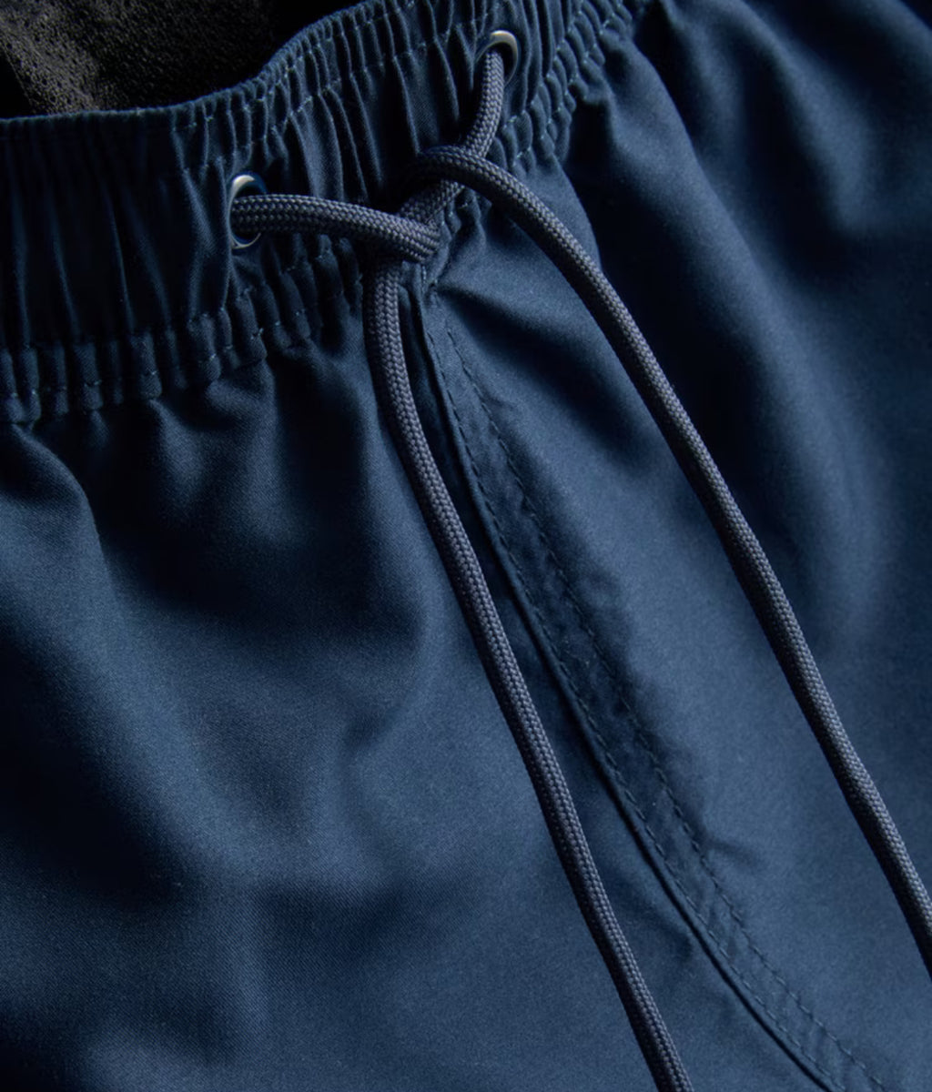 pair of cargo swimming shorts with a drawstring waistline