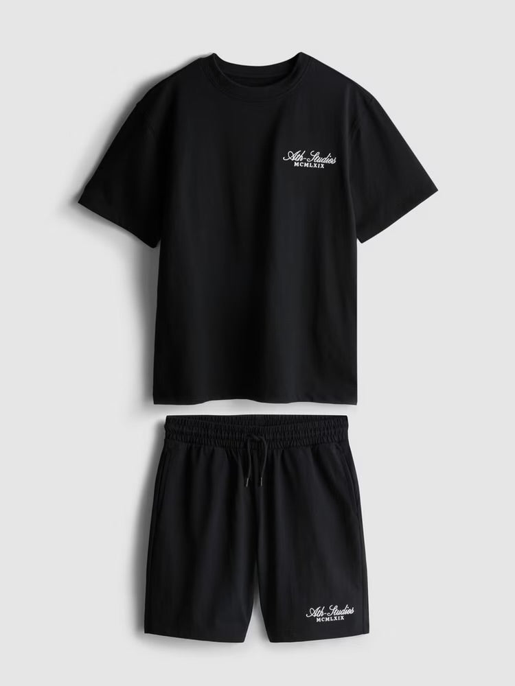 A tee and shorts clothing co-ord with script embroider