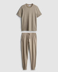 A pair of textured long pyjamas with a shortsleeved top and drawstring bottoms