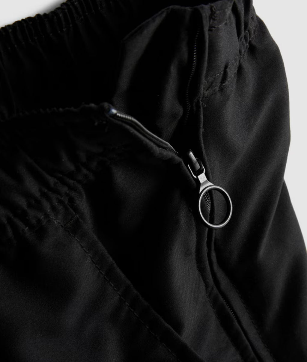 Adaptive swim shorts with elasticated waist, cargo pocket and easy zip opening