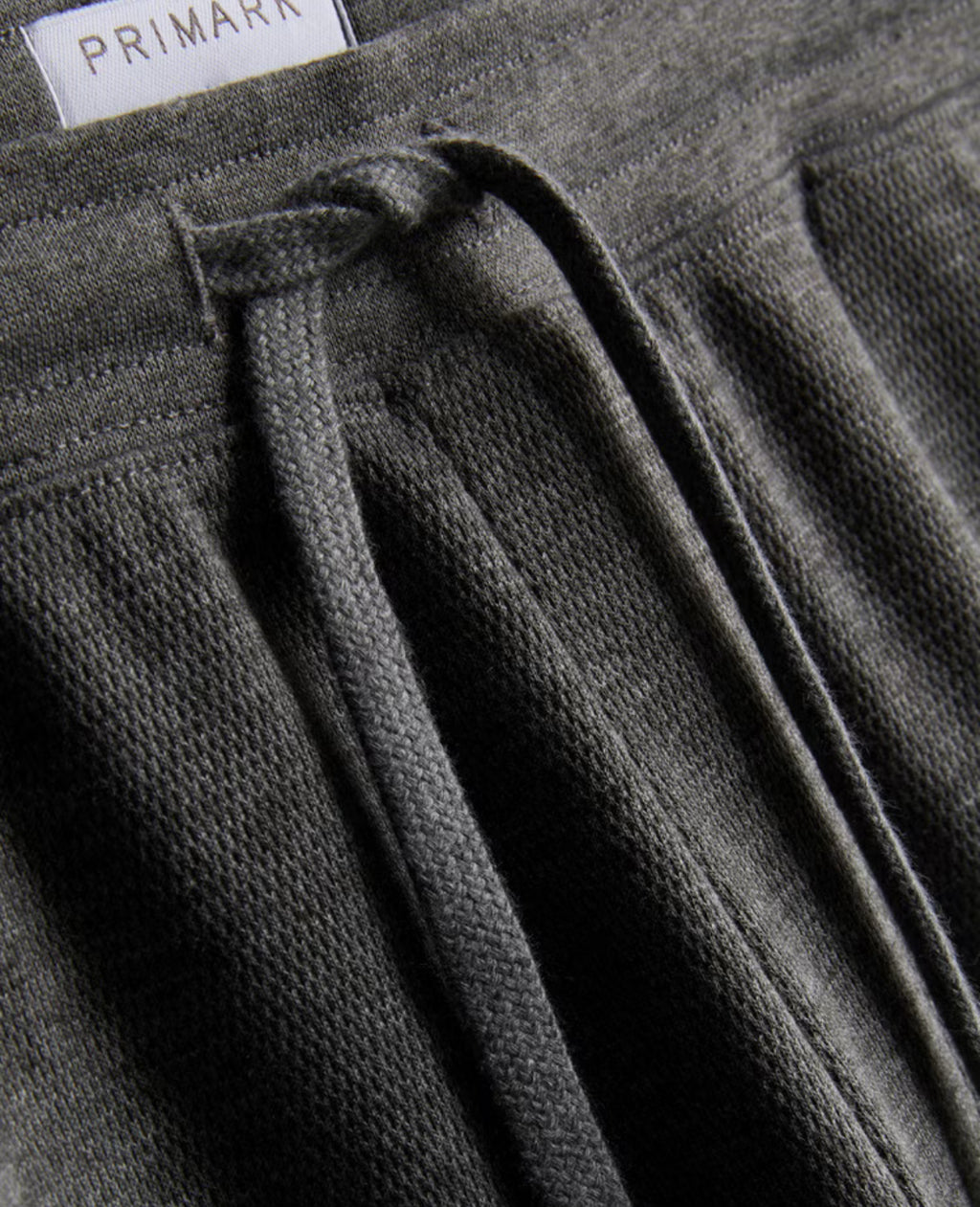 Two sets of pyjama bottoms with textured finish and drawstring waistline