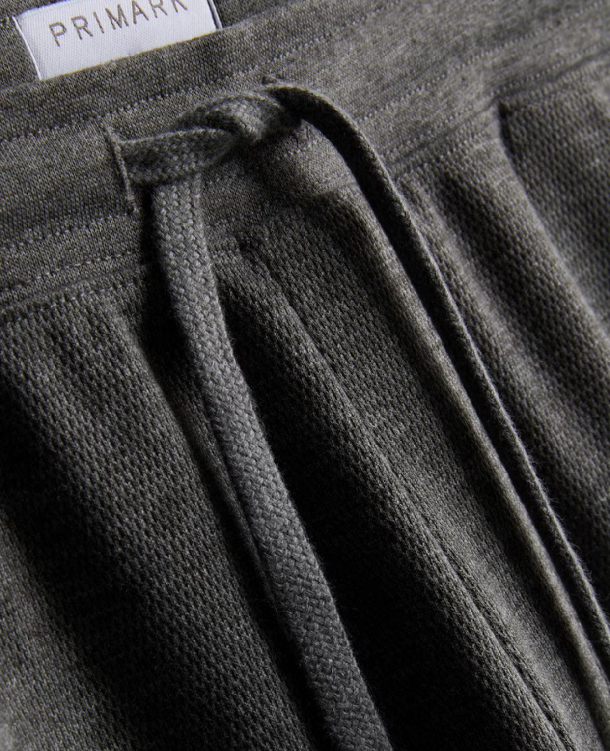 Two sets of pyjama bottoms with textured finish and drawstring waistline