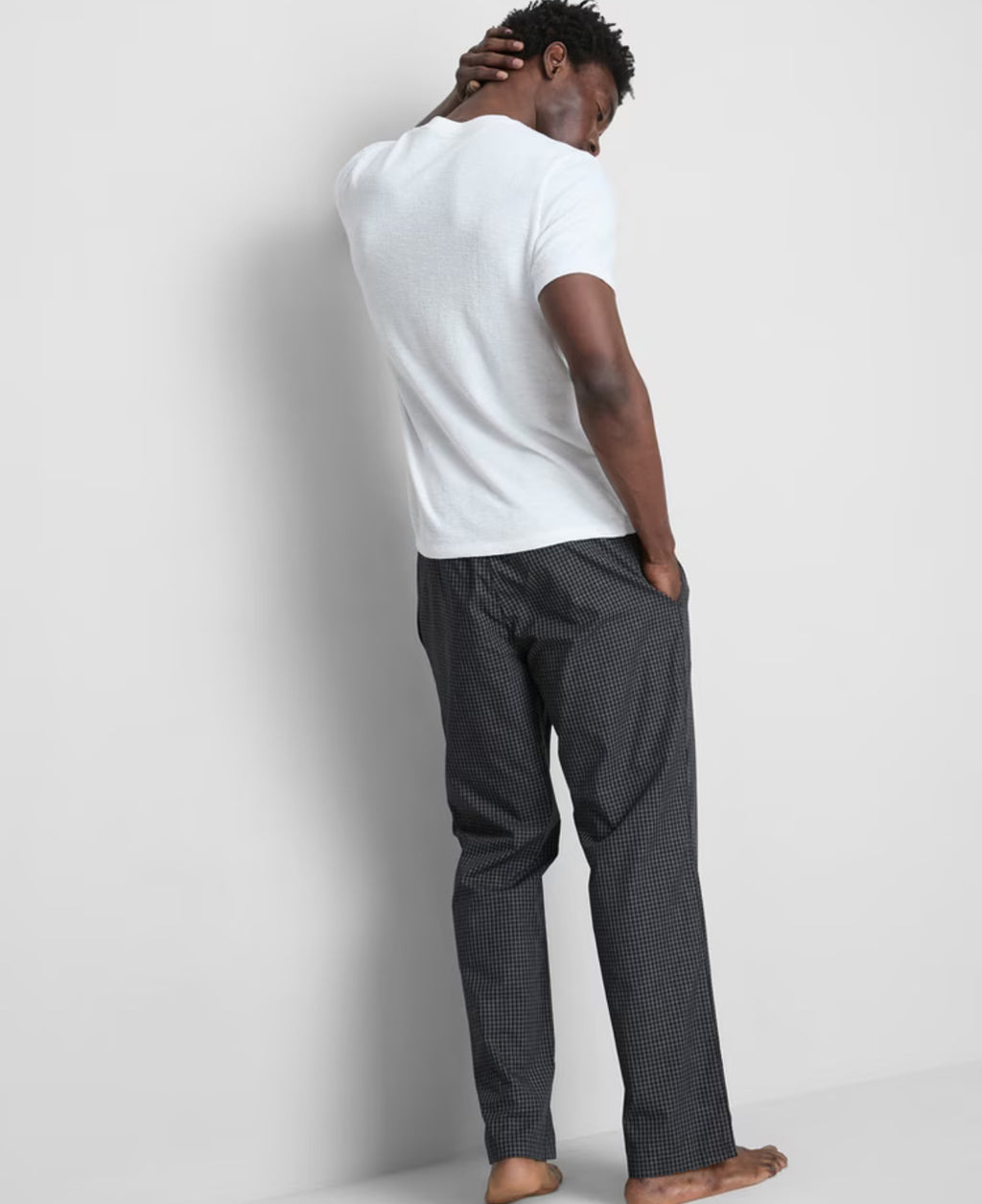 A pair of textured long putjamas wirh short sleeved top and bottoms