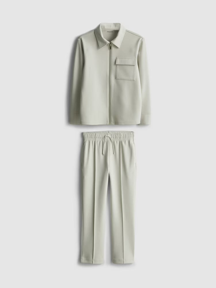 A zip-up jacket and pintuck joggers clothing co-ord