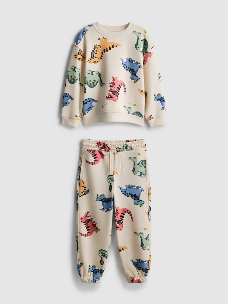 A sweatshirt and joggers clothing co-ord with an all-over dinosaur desian