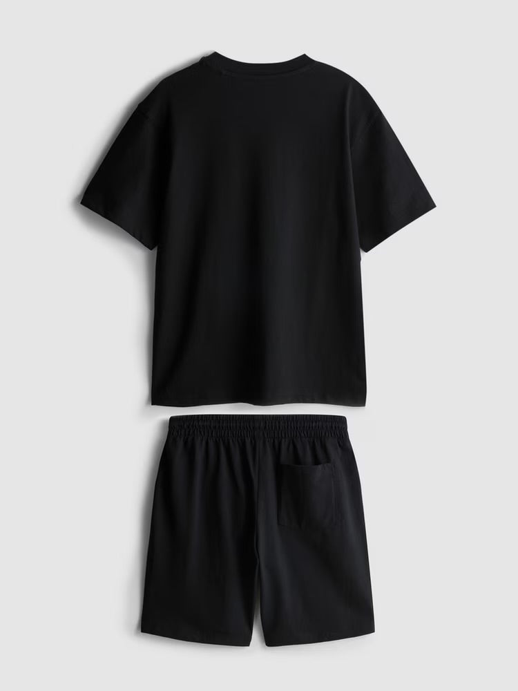 A tee and shorts clothing co-ord with script embroider