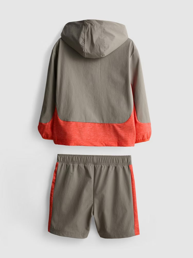 An activewear track jacket and shorts clothing co-ord