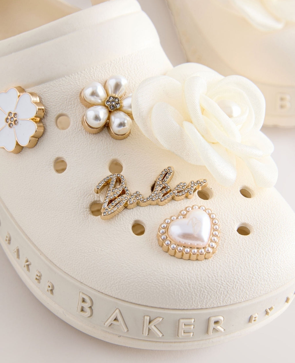 Baker by Ted Baker Ivory Bow
Charm Clog Sandals