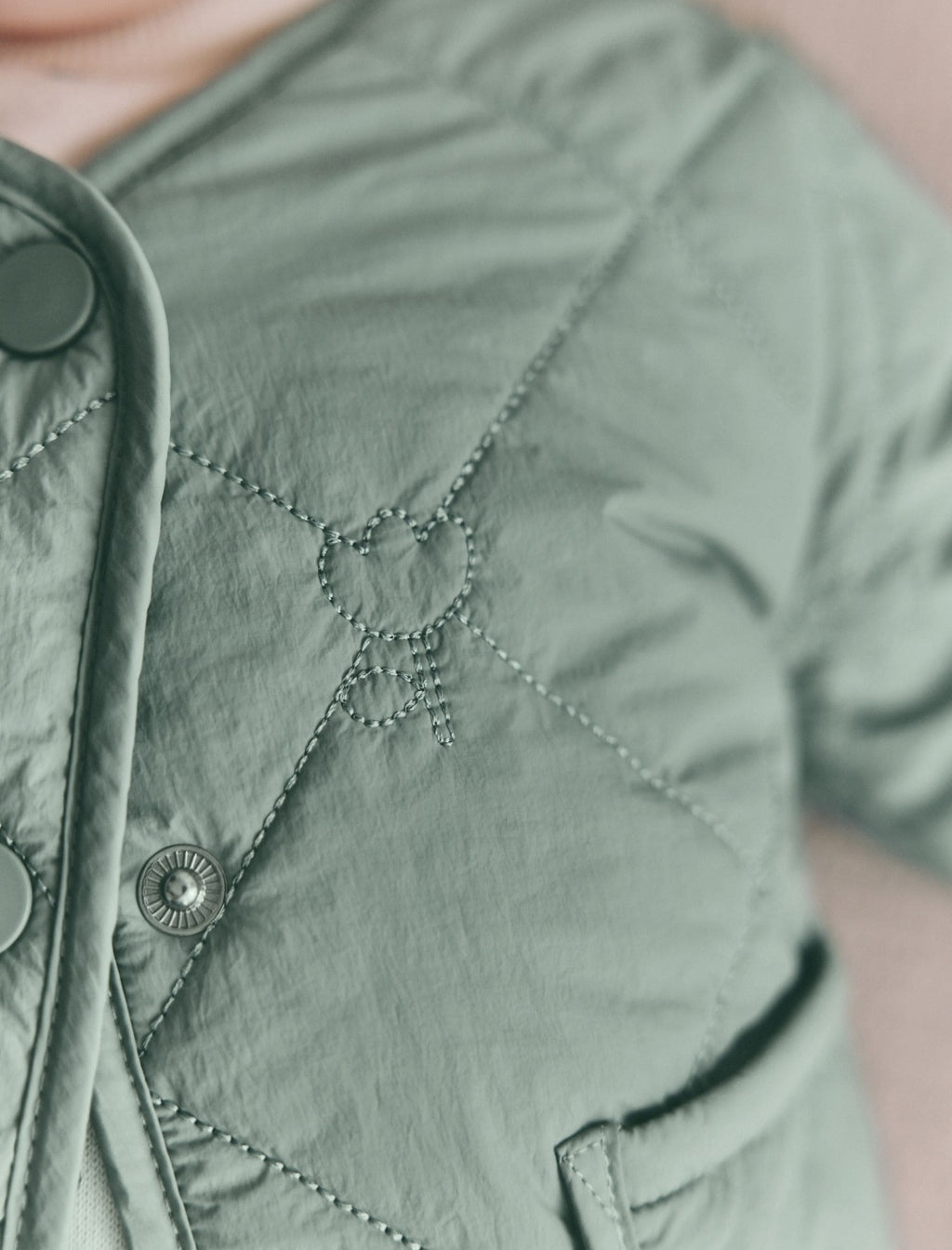 Sage Green Tulip Quilted Nylon
Baby Jacket