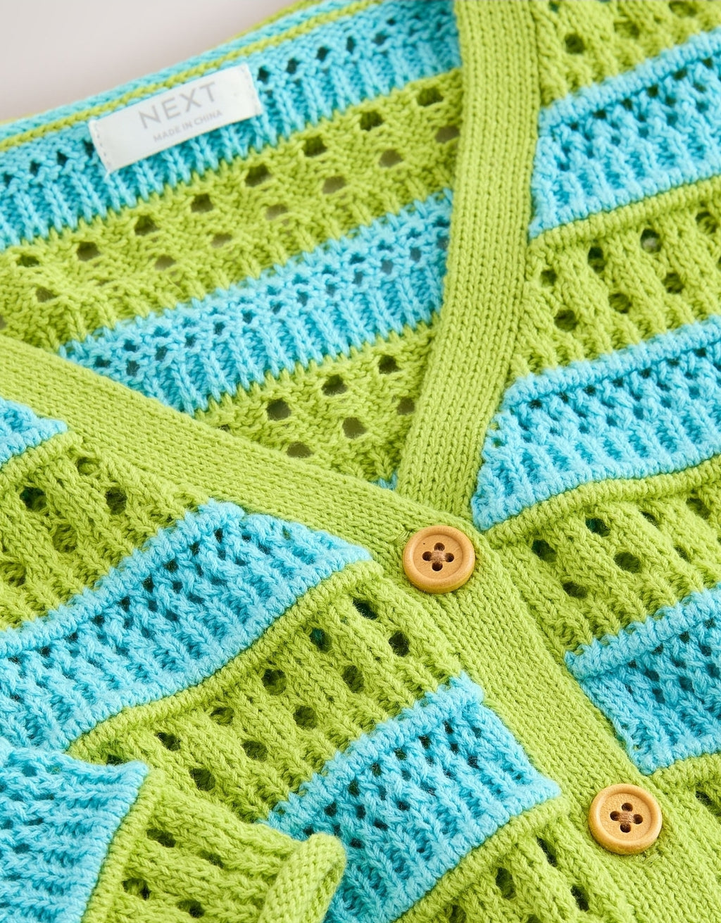 Green/Blue V-Neck Crochet
Cardigan