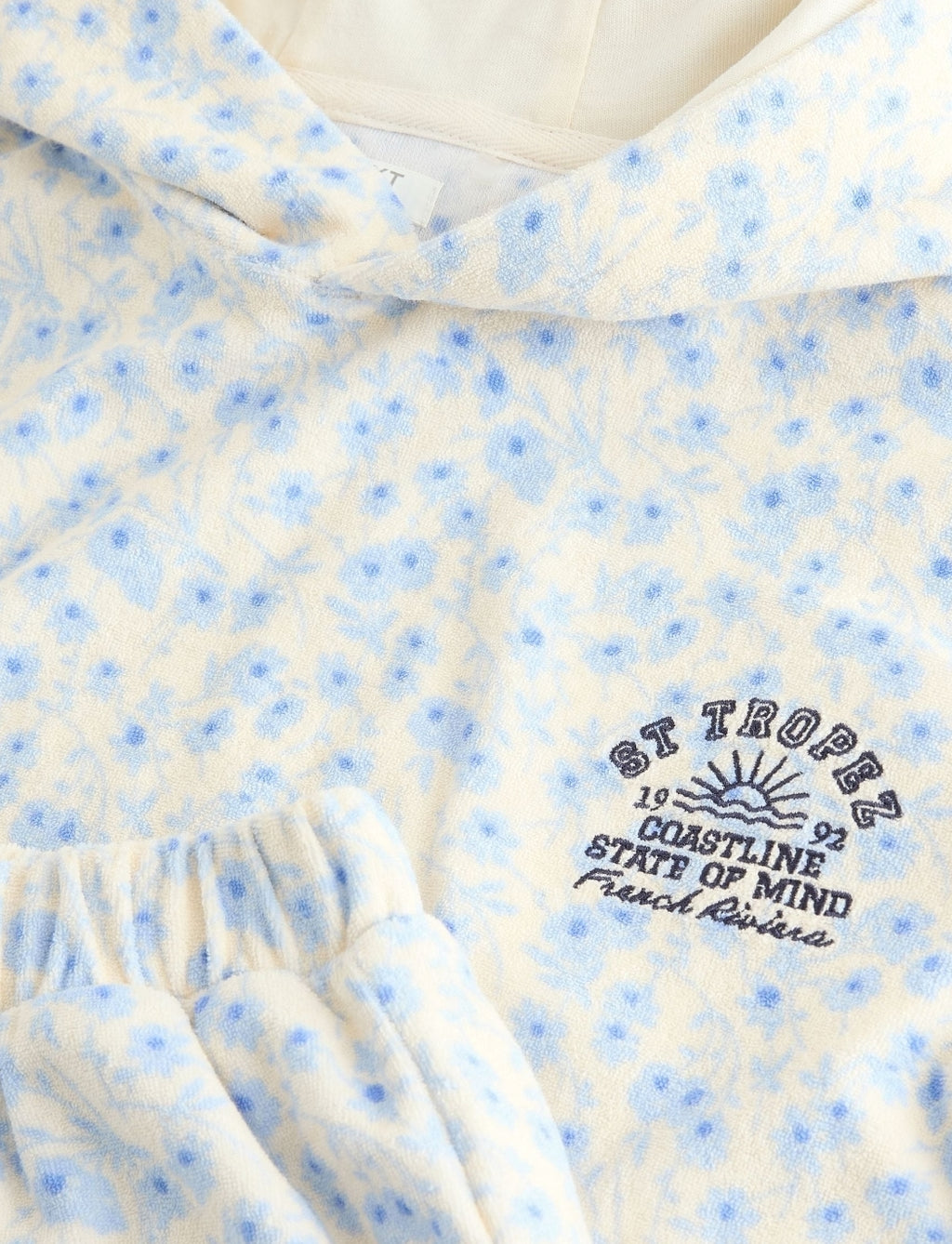 Blue/White Floral Ditsy Towelling
Hoodie And Shorts Set