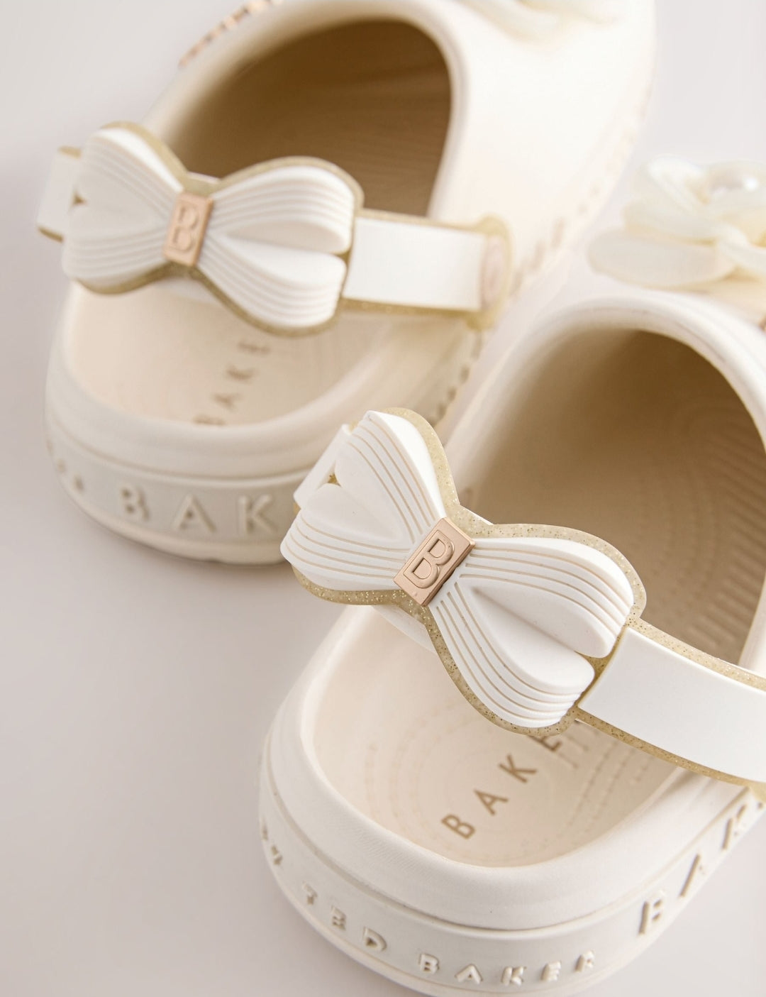 Baker by Ted Baker Ivory Bow
Charm Clog Sandals