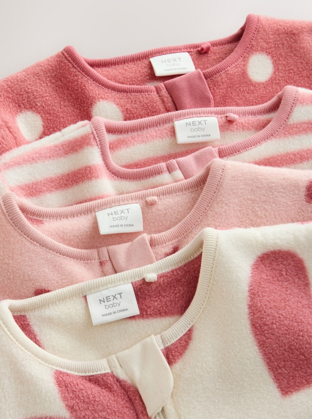 Pink Heart Baby Micro Fleece
Two Way Zip Sleepsuits 4 Pack