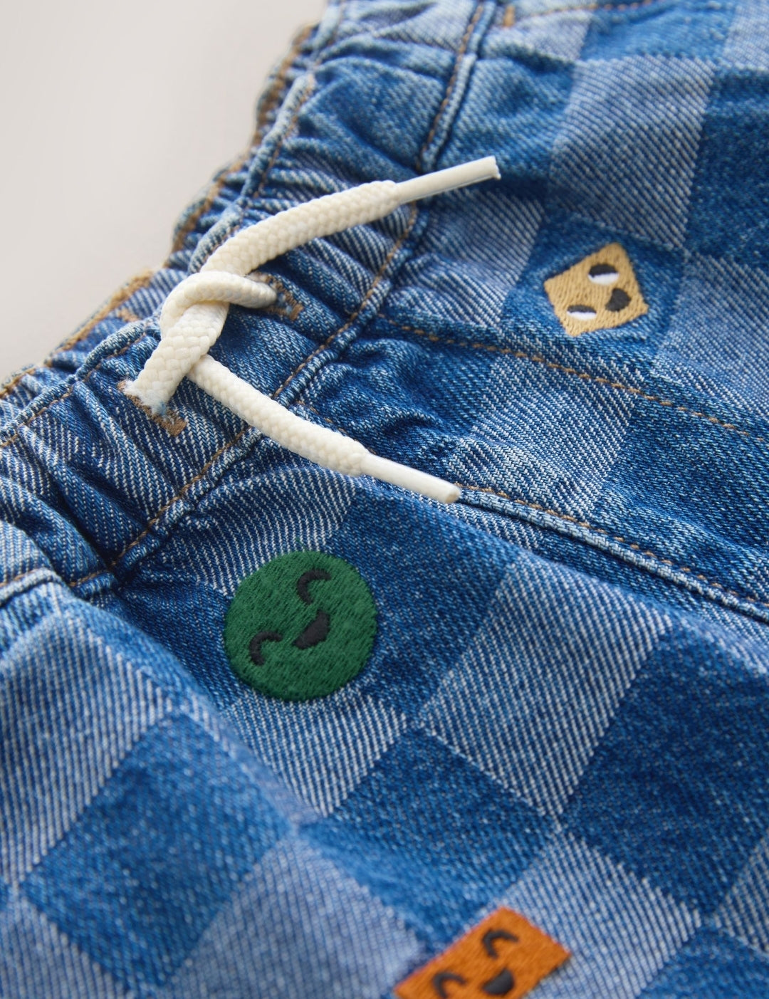 Mid Blue Checkerboard With All Over
Embroidery Wide Fit Jeans