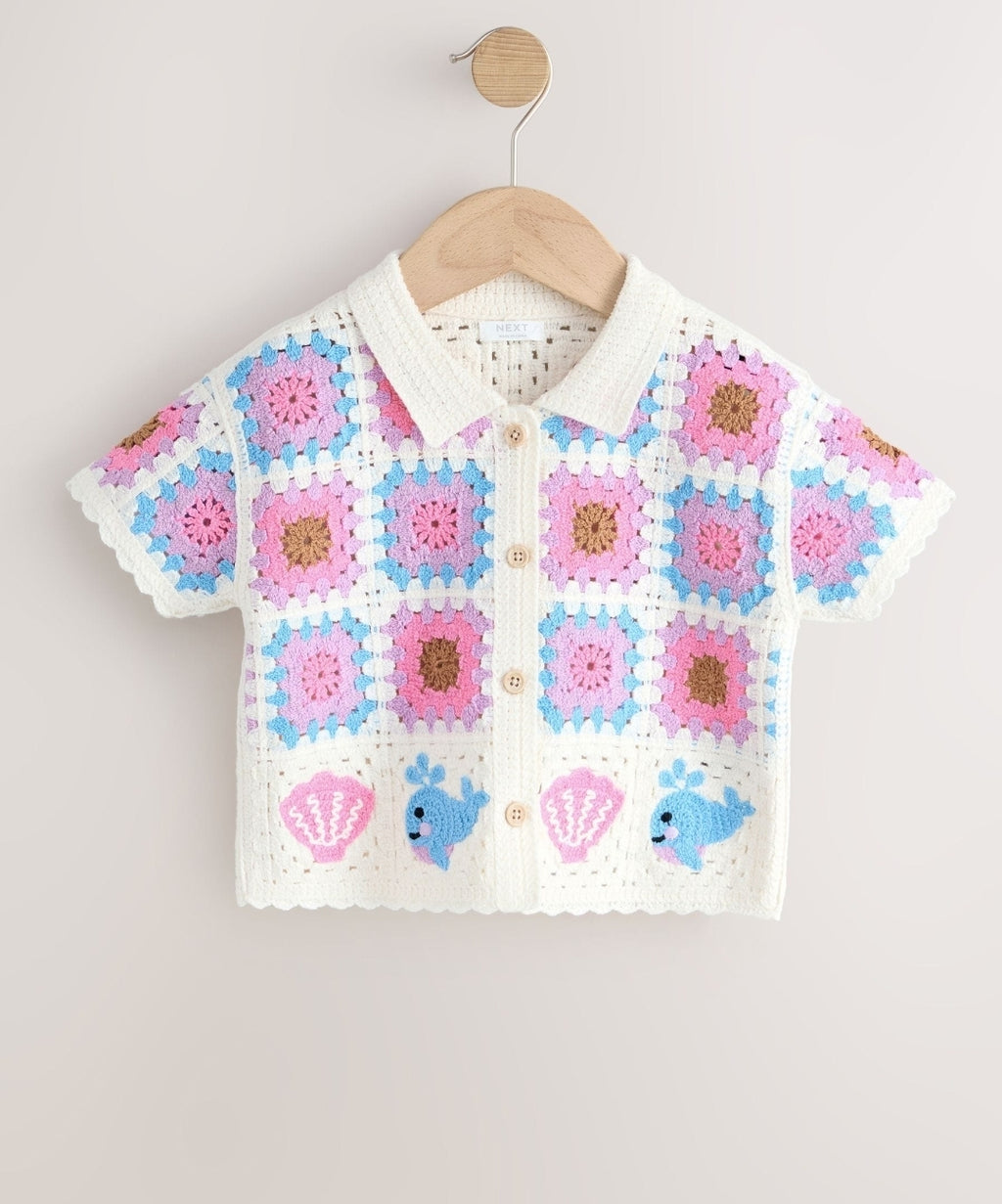 Cream Crochet Whale and Seashell
Top