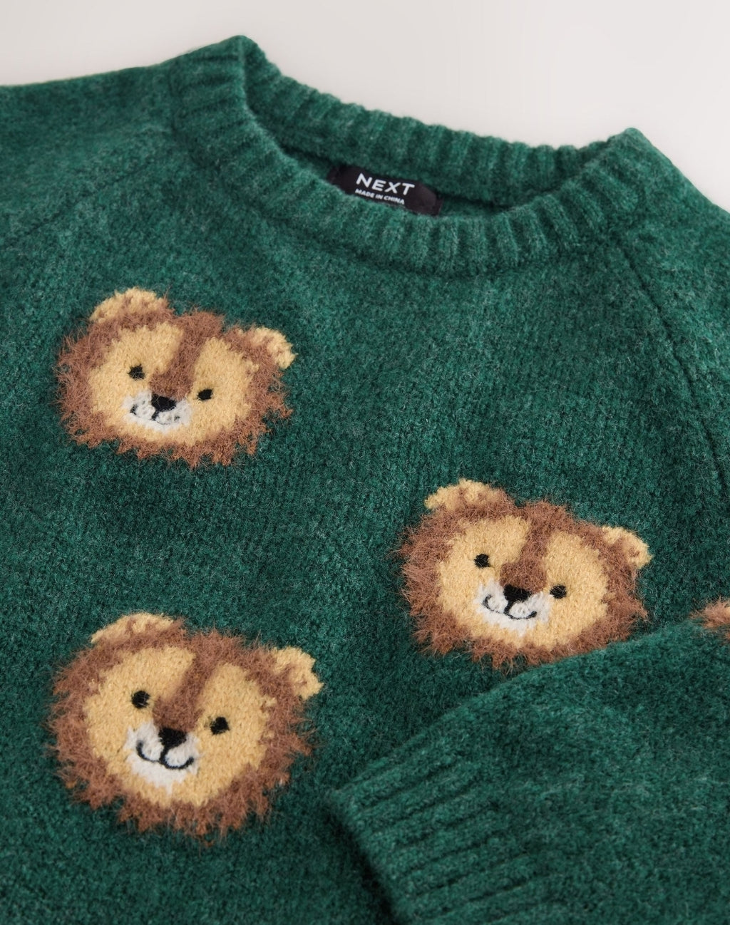 Green Lion All Over Character
Knitted Crew Neck Jumper
