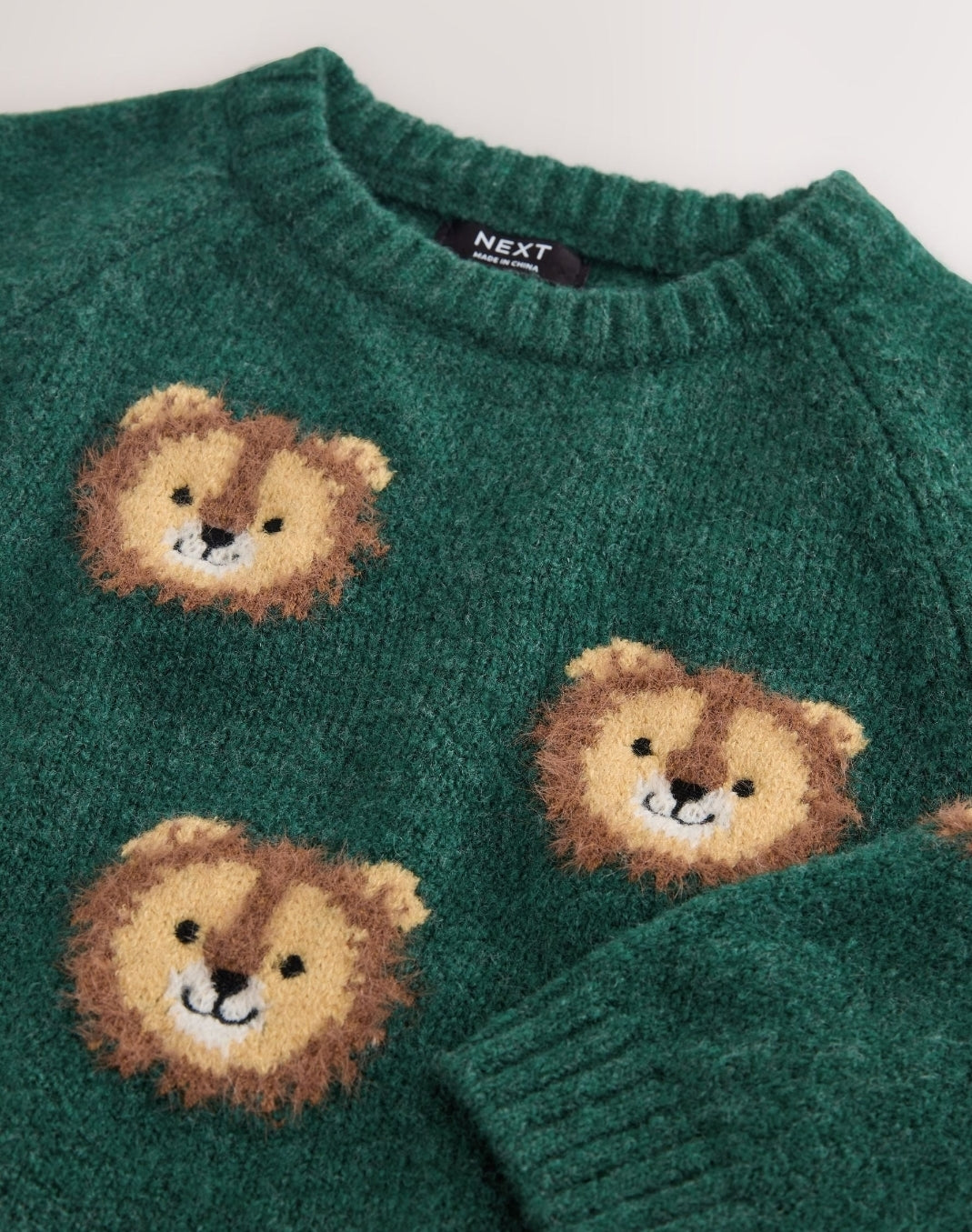 Green Lion All Over Character
Knitted Crew Neck Jumper